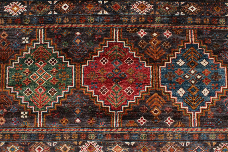 7x10 Brown and Multicolor Tribal Rug