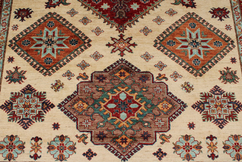 7x10 Ivory and Multicolor Kazak Tribal Rug