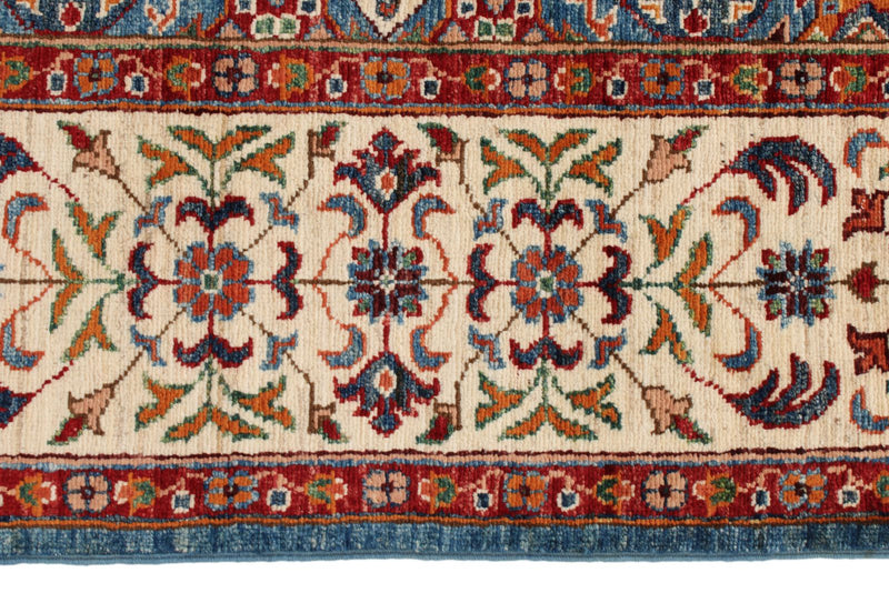 6x9 Blue and Ivory Turkish Tribal Rug