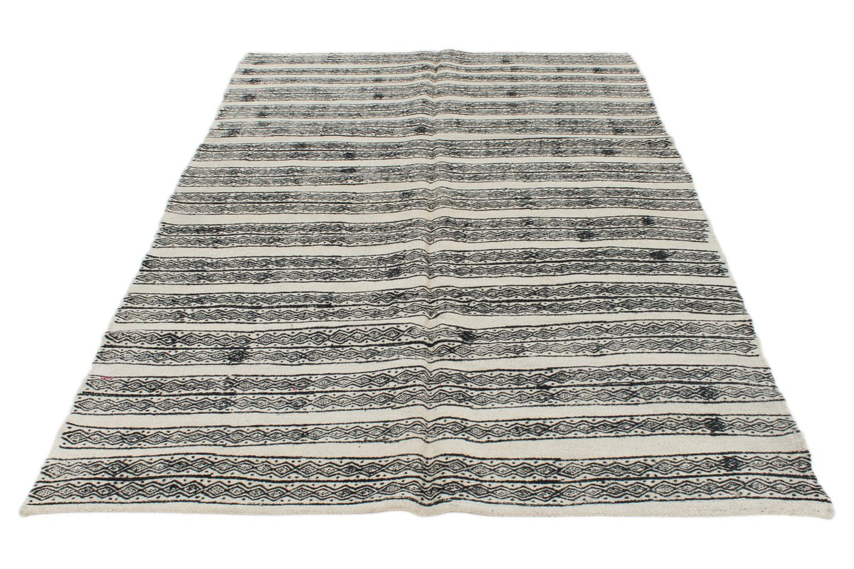 6x9 Ivory and Black Turkish Tribal Rug