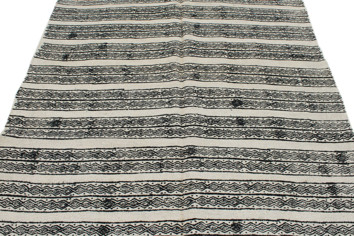 6x9 Ivory and Black Turkish Tribal Rug