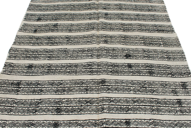 6x9 Ivory and Black Turkish Tribal Rug