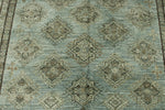7x10 Light Blue and Ivory Turkish Tribal Rug