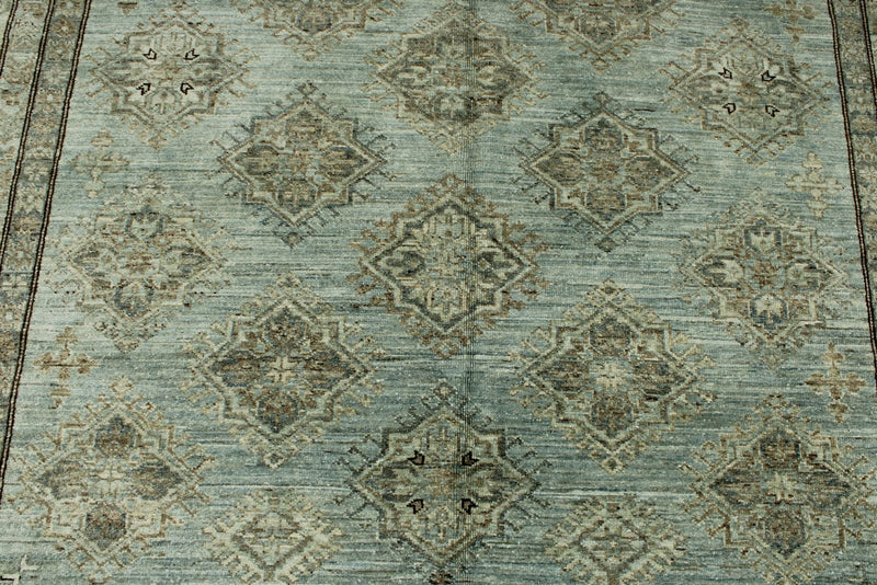7x10 Light Blue and Ivory Turkish Tribal Rug