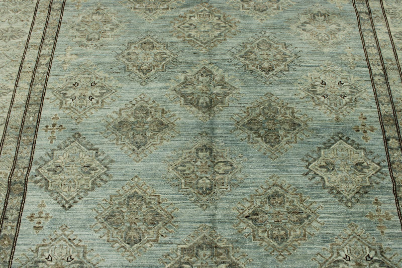 7x10 Light Blue and Ivory Turkish Tribal Rug