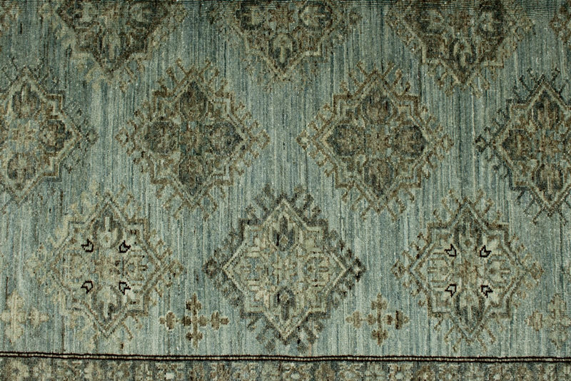 7x10 Light Blue and Ivory Turkish Tribal Rug
