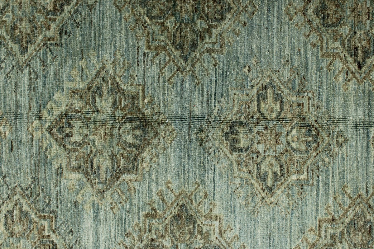 7x10 Light Blue and Ivory Turkish Tribal Rug