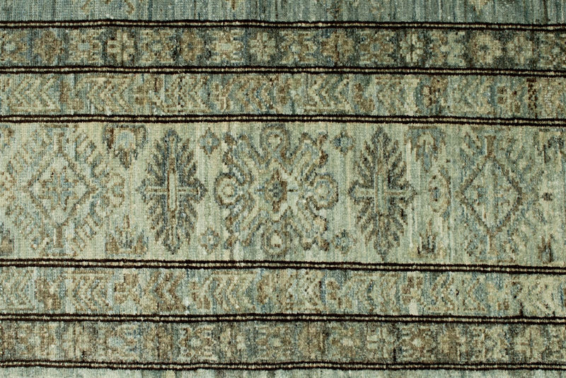 7x10 Light Blue and Ivory Turkish Tribal Rug