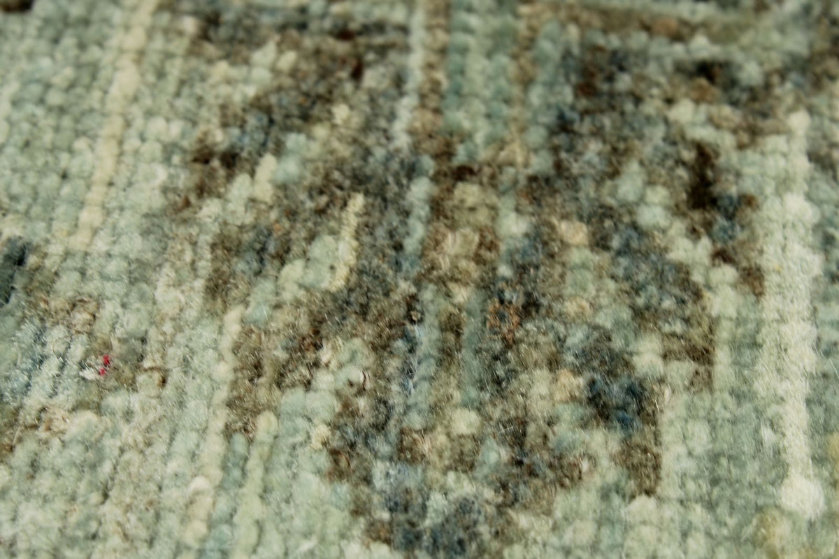 7x10 Light Blue and Ivory Turkish Tribal Rug