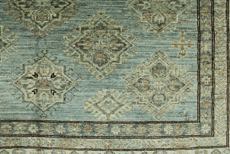 7x10 Light Blue and Ivory Turkish Tribal Rug
