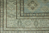 7x10 Light Blue and Ivory Turkish Tribal Rug