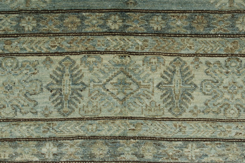 7x10 Light Blue and Ivory Turkish Tribal Rug