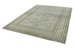 7x10 Light Blue and Ivory Turkish Tribal Rug