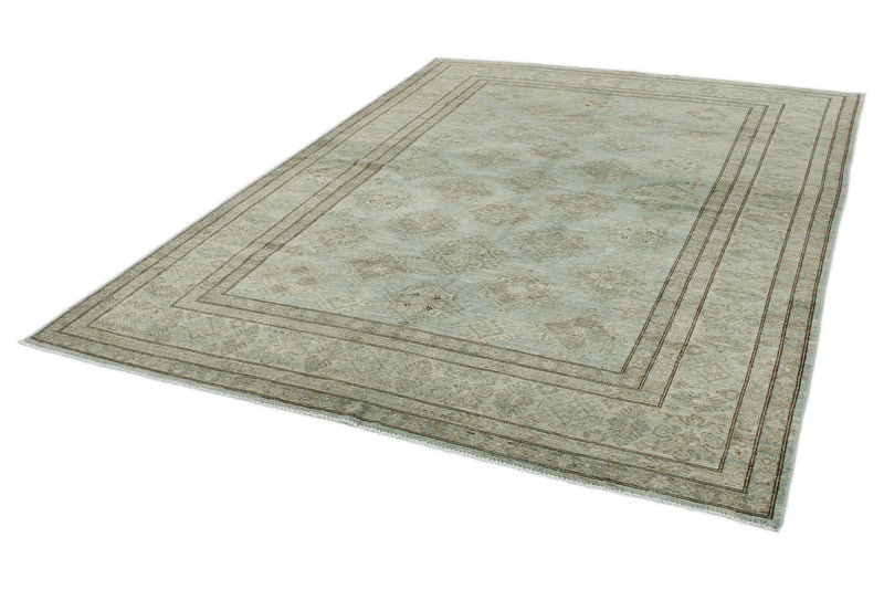 7x10 Light Blue and Ivory Turkish Tribal Rug