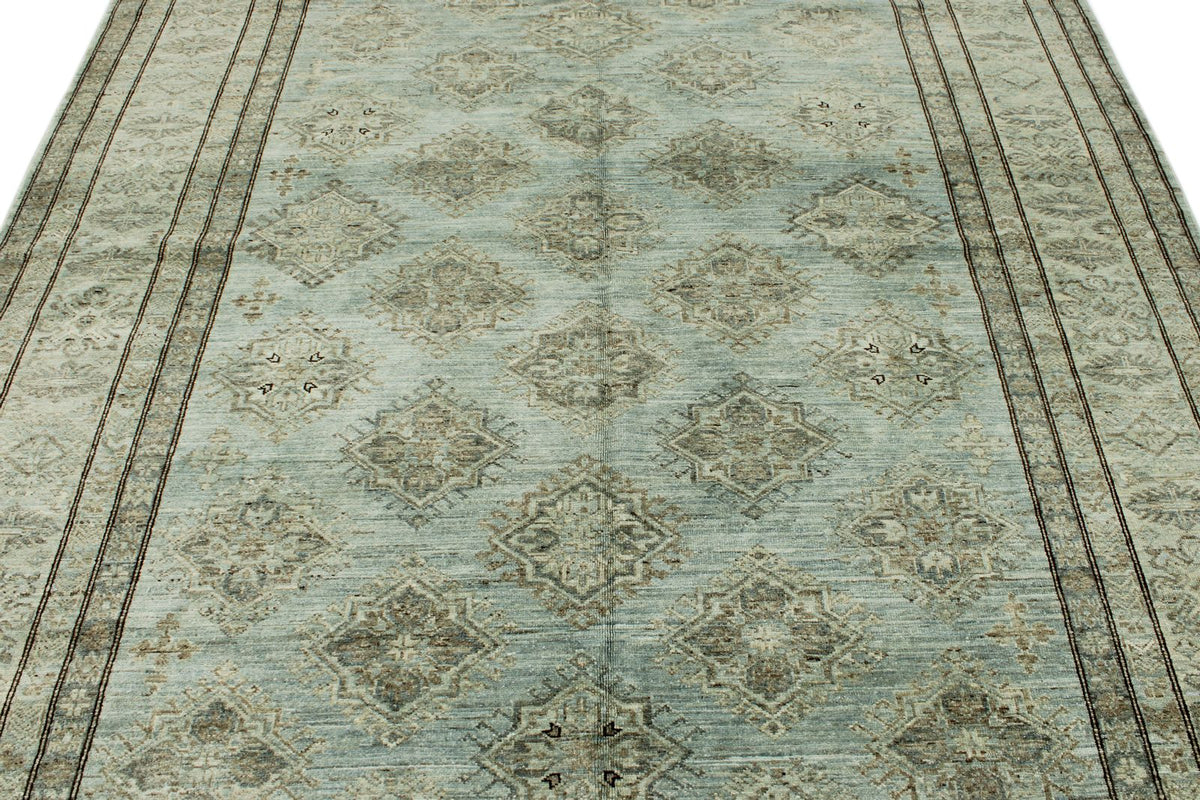 7x10 Light Blue and Ivory Turkish Tribal Rug