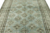 7x10 Light Blue and Ivory Turkish Tribal Rug