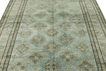 7x10 Light Blue and Ivory Turkish Tribal Rug