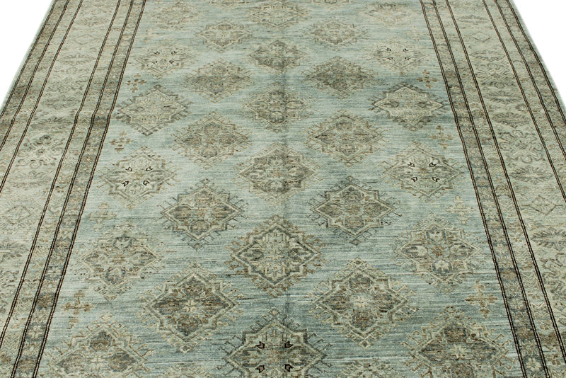 7x10 Light Blue and Ivory Turkish Tribal Rug