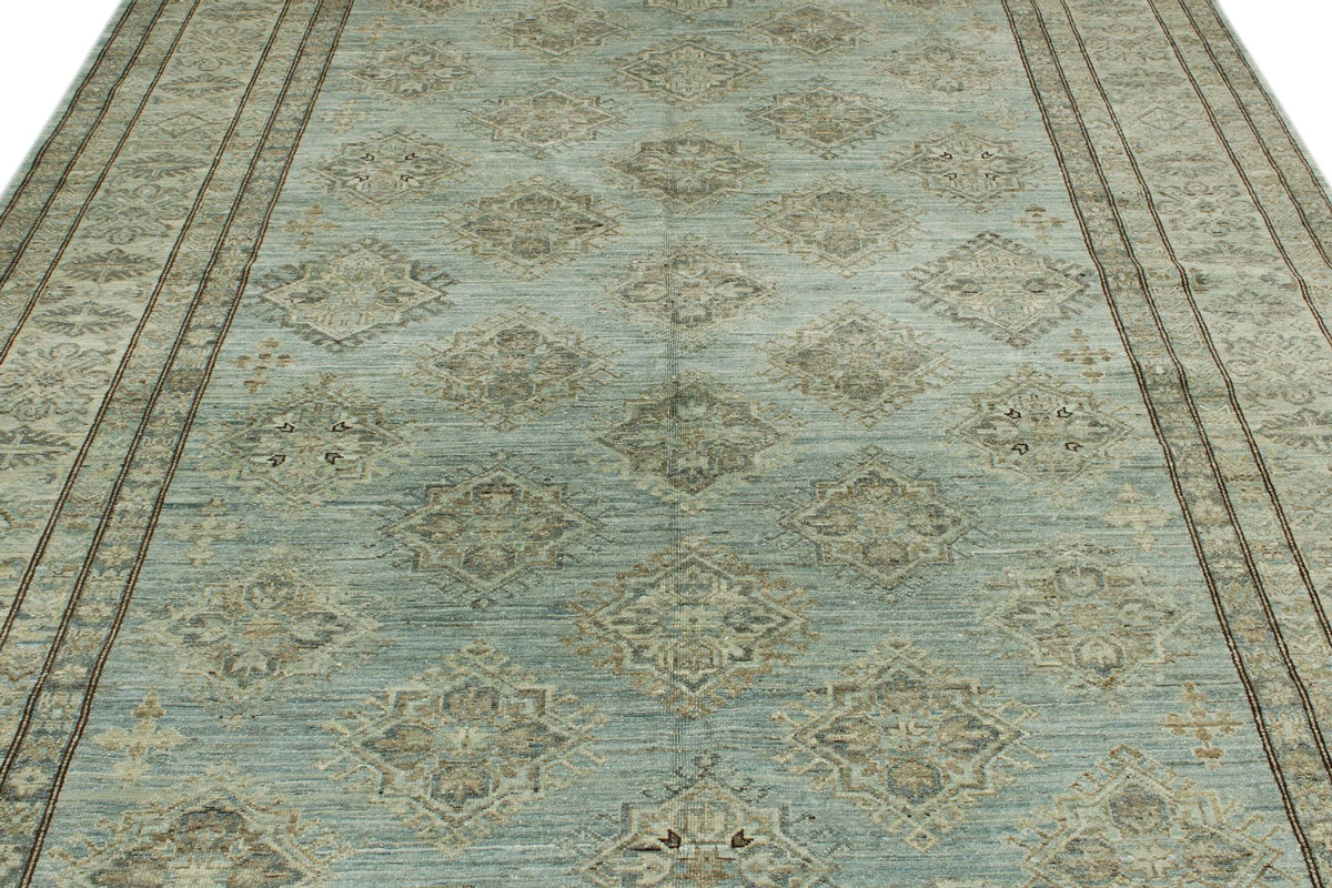 7x10 Light Blue and Ivory Turkish Tribal Rug