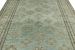 7x10 Light Blue and Ivory Turkish Tribal Rug