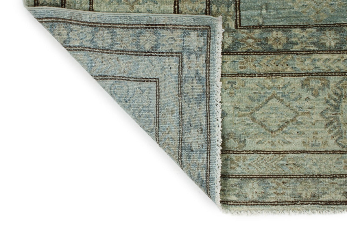 7x10 Light Blue and Ivory Turkish Tribal Rug