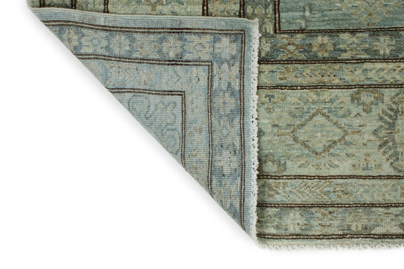 7x10 Light Blue and Ivory Turkish Tribal Rug