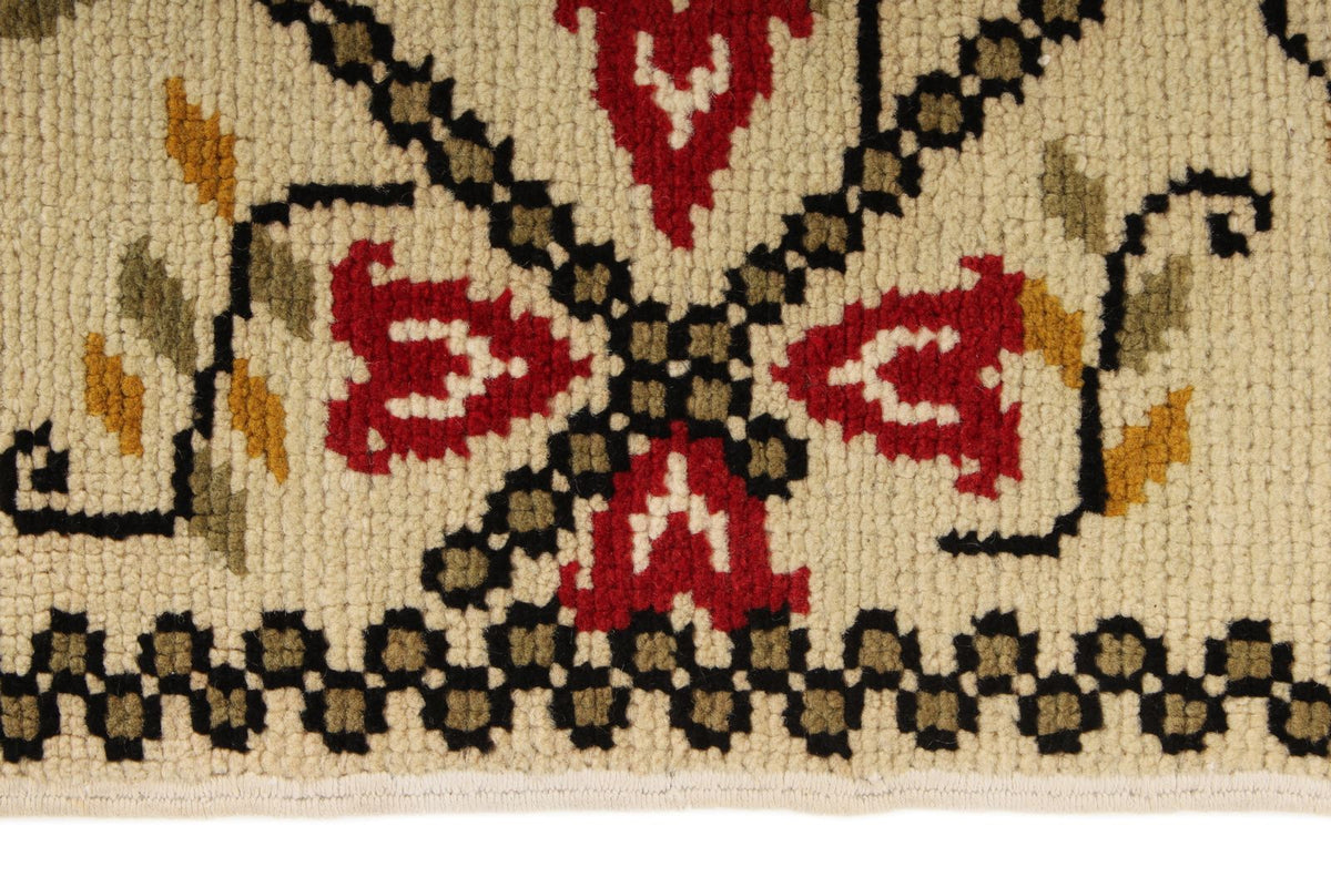 5x9 Ivory and Red Turkish Tribal Rug