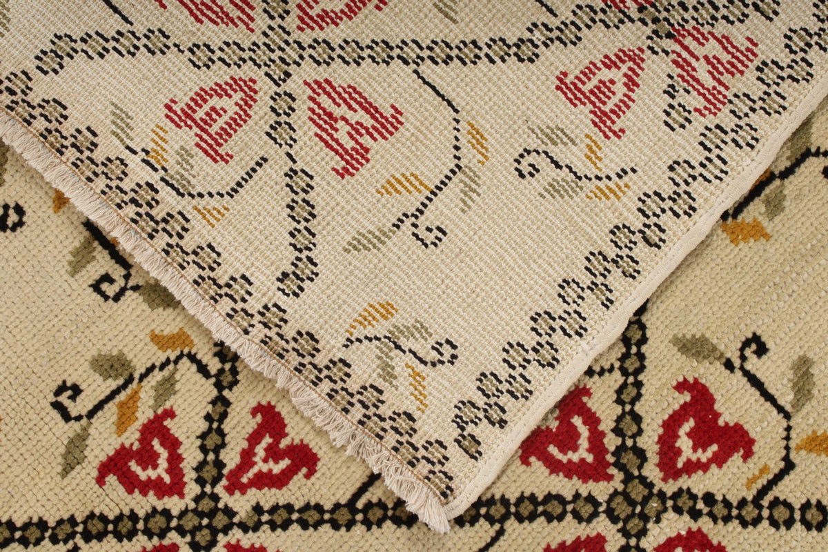 5x9 Ivory and Red Turkish Tribal Rug
