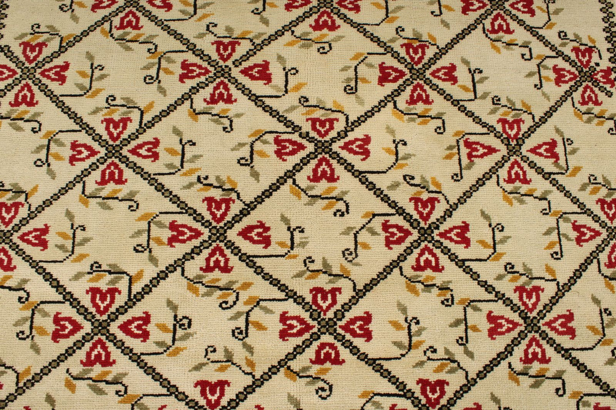 5x9 Ivory and Red Turkish Tribal Rug