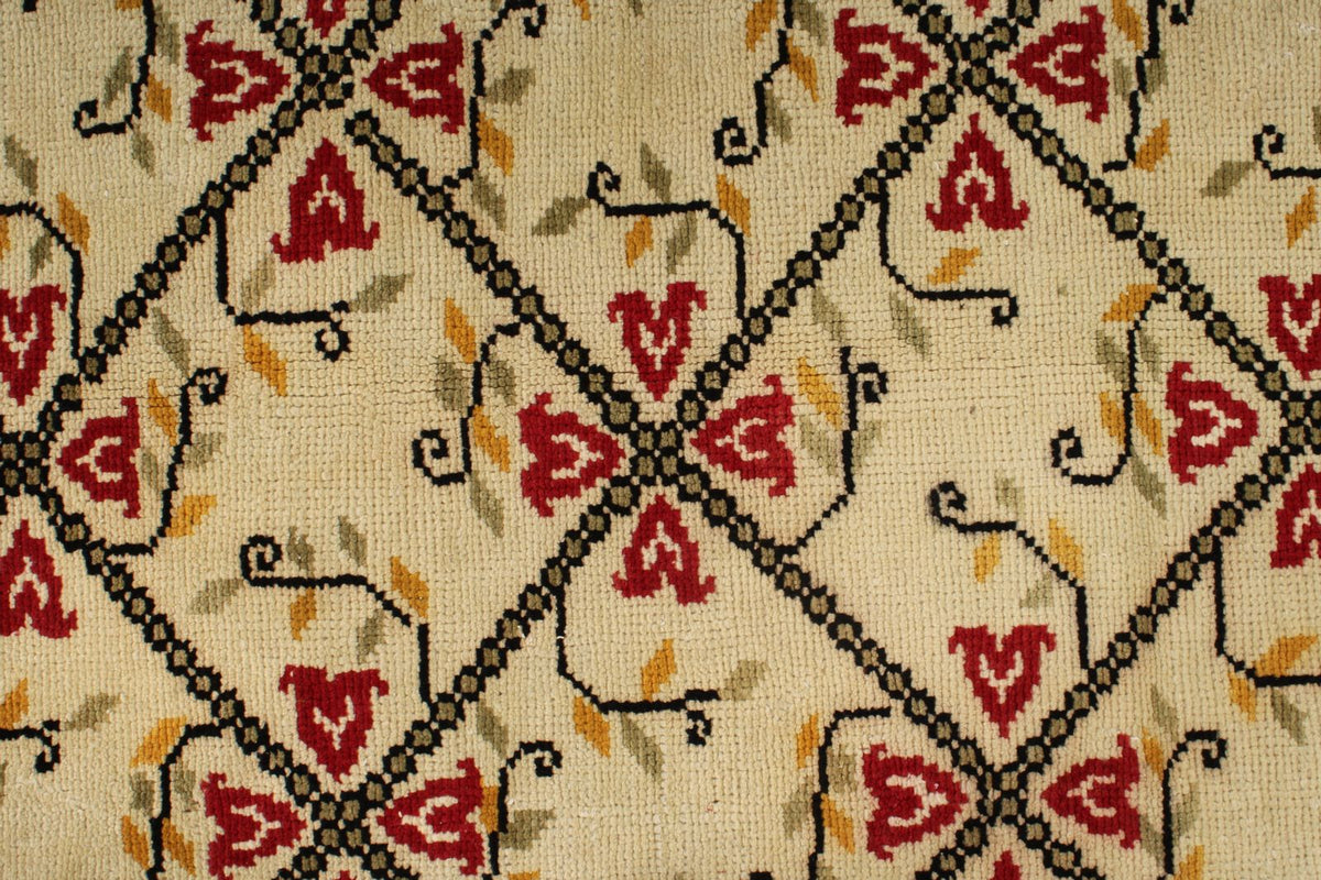 5x9 Ivory and Red Turkish Tribal Rug