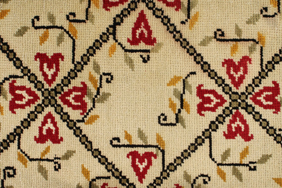 5x9 Ivory and Red Turkish Tribal Rug