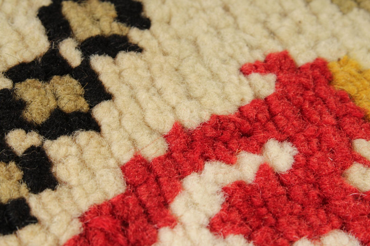 5x9 Ivory and Red Turkish Tribal Rug