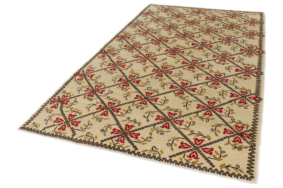 5x9 Ivory and Red Turkish Tribal Rug