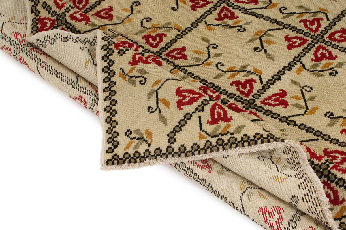 5x9 Ivory and Red Turkish Tribal Rug