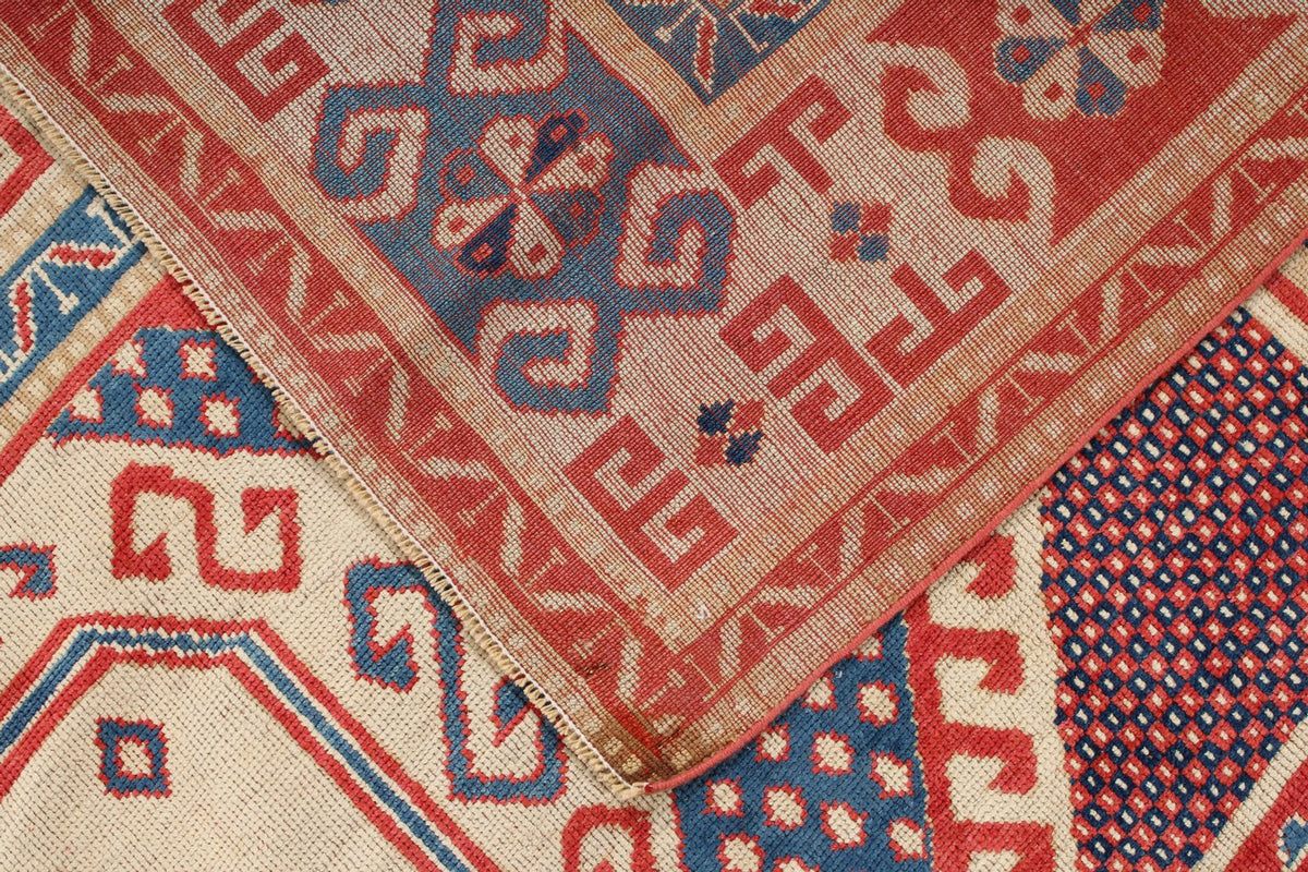 7x9 Multicolor and Ivory Kazak Tribal Rug