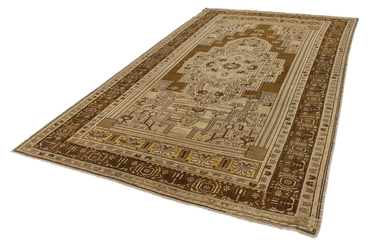 7x12 Ivory and Brown Turkish Tribal Rug