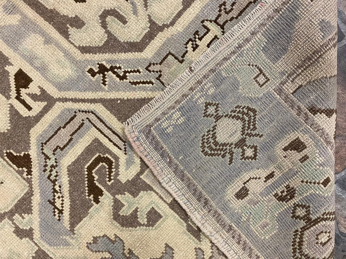 6x9 Ivory and Purple Turkish Tribal Rug