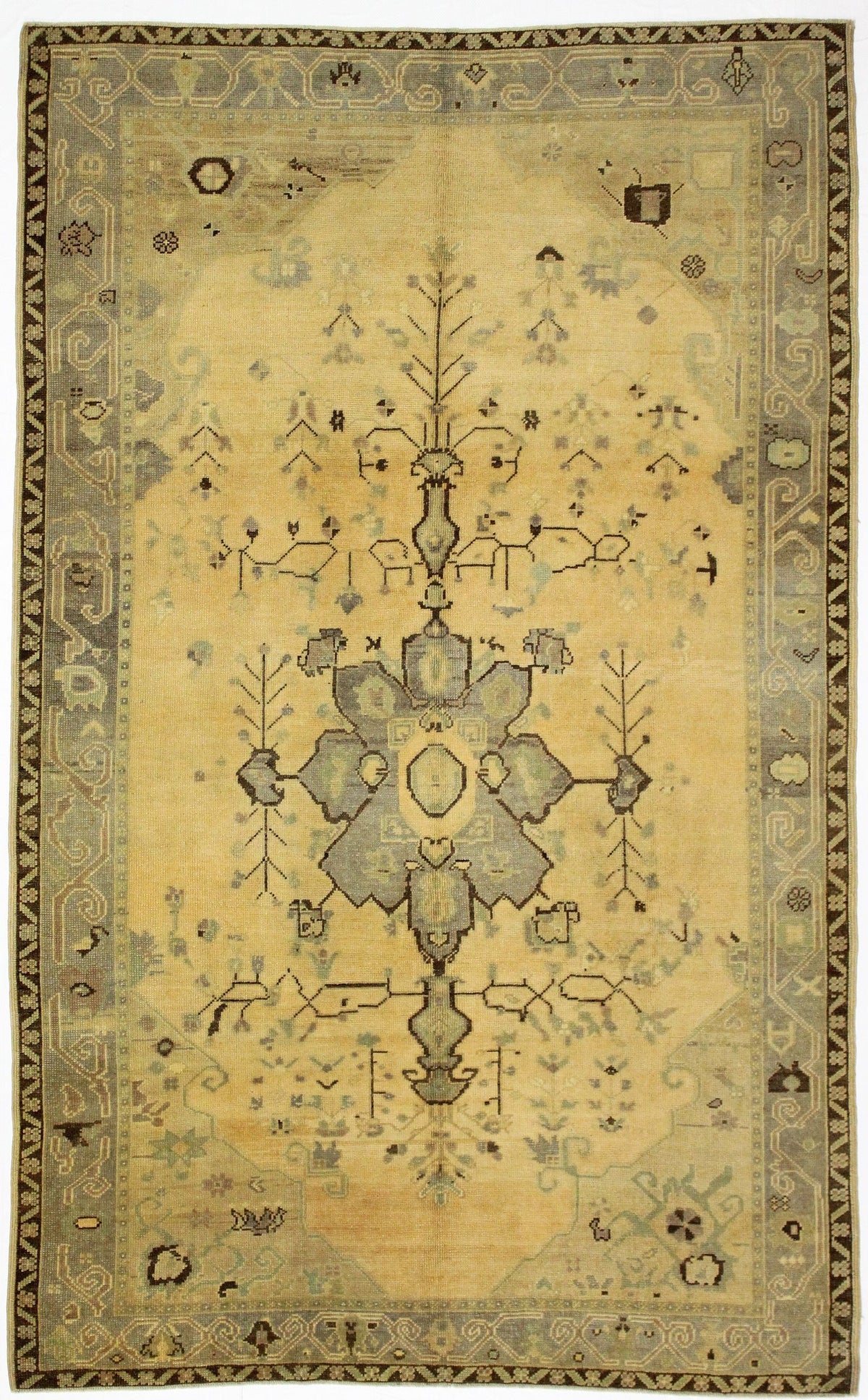6x9 Ivory and Gold Turkish Tribal Rug