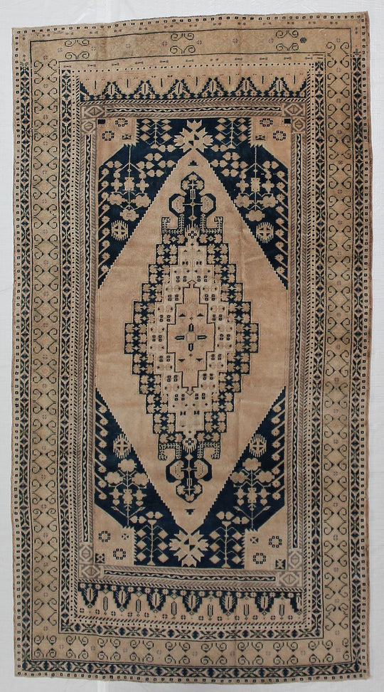 5x9 Ivory and Navy Turkish Tribal Rug