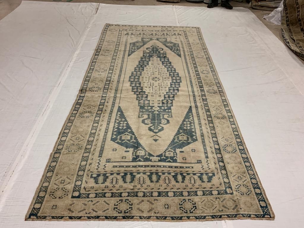 5x9 Ivory and Blue Turkish Tribal Rug