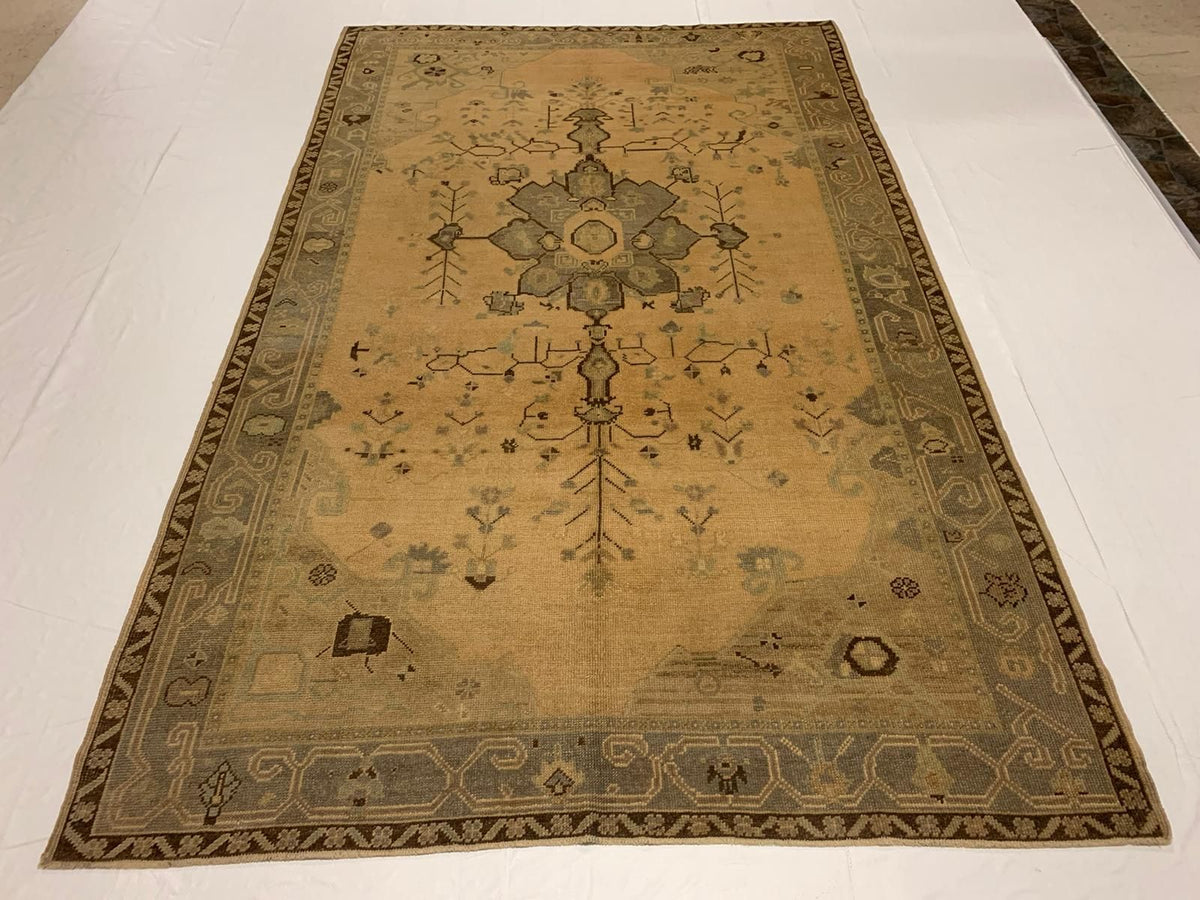 6x9 Ivory and Gold Turkish Tribal Rug
