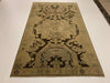 5x9 Ivory and Black Turkish Tribal Rug