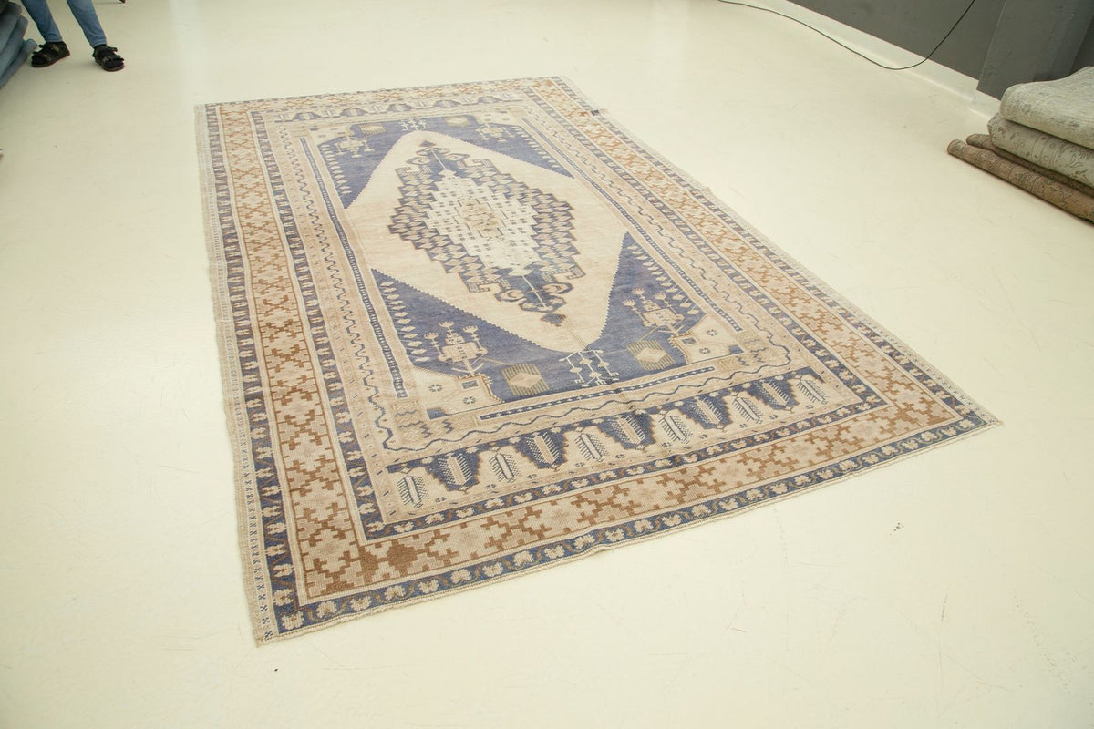 6x10 Blue and Ivory Turkish Tribal Rug