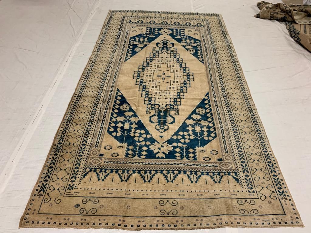 5x9 Ivory and Navy Turkish Tribal Rug