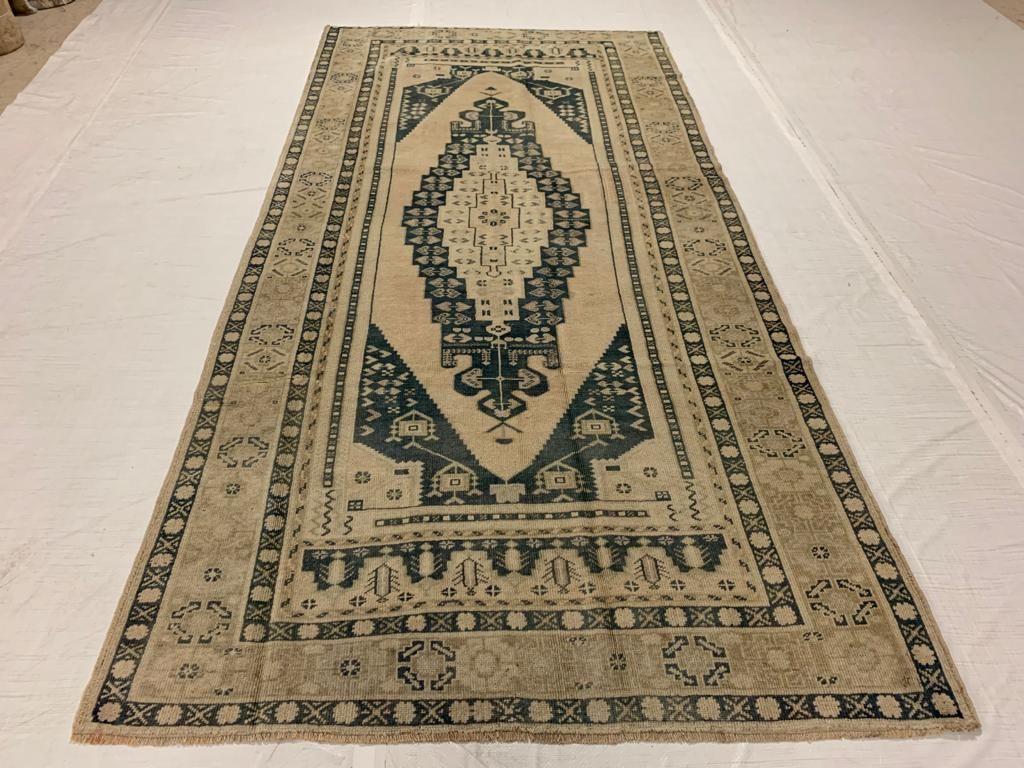 5x9 Ivory and Blue Turkish Tribal Rug