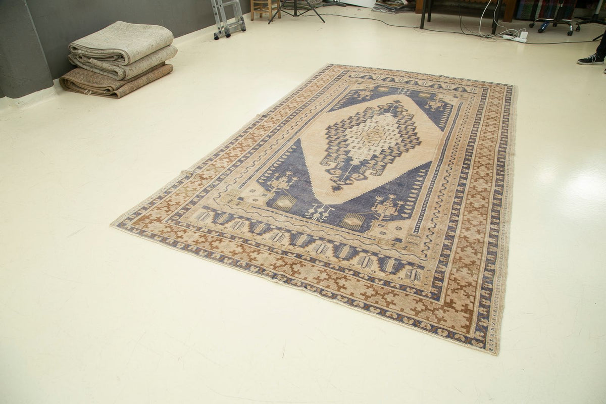 6x10 Blue and Ivory Turkish Tribal Rug