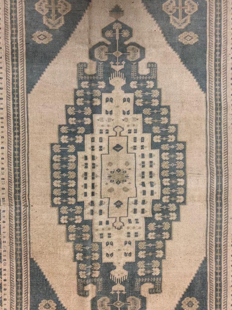5x9 Ivory and Green Turkish Tribal Rug