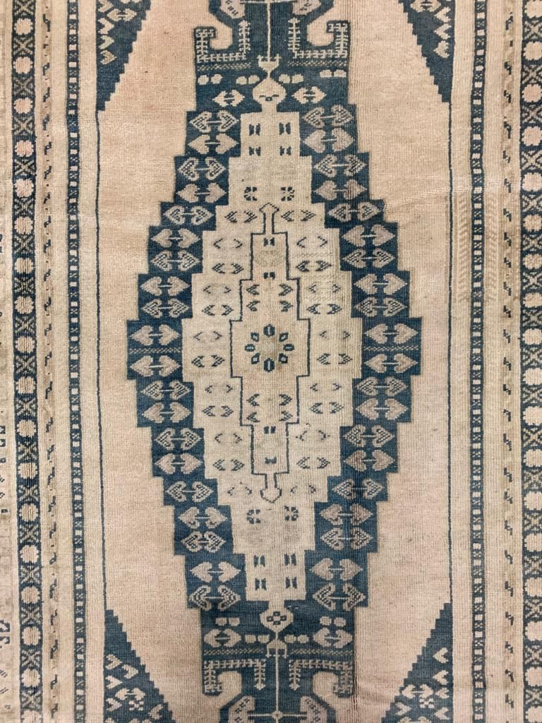5x9 Ivory and Blue Turkish Tribal Rug