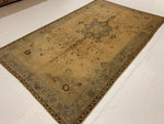 6x9 Ivory and Gold Turkish Tribal Rug