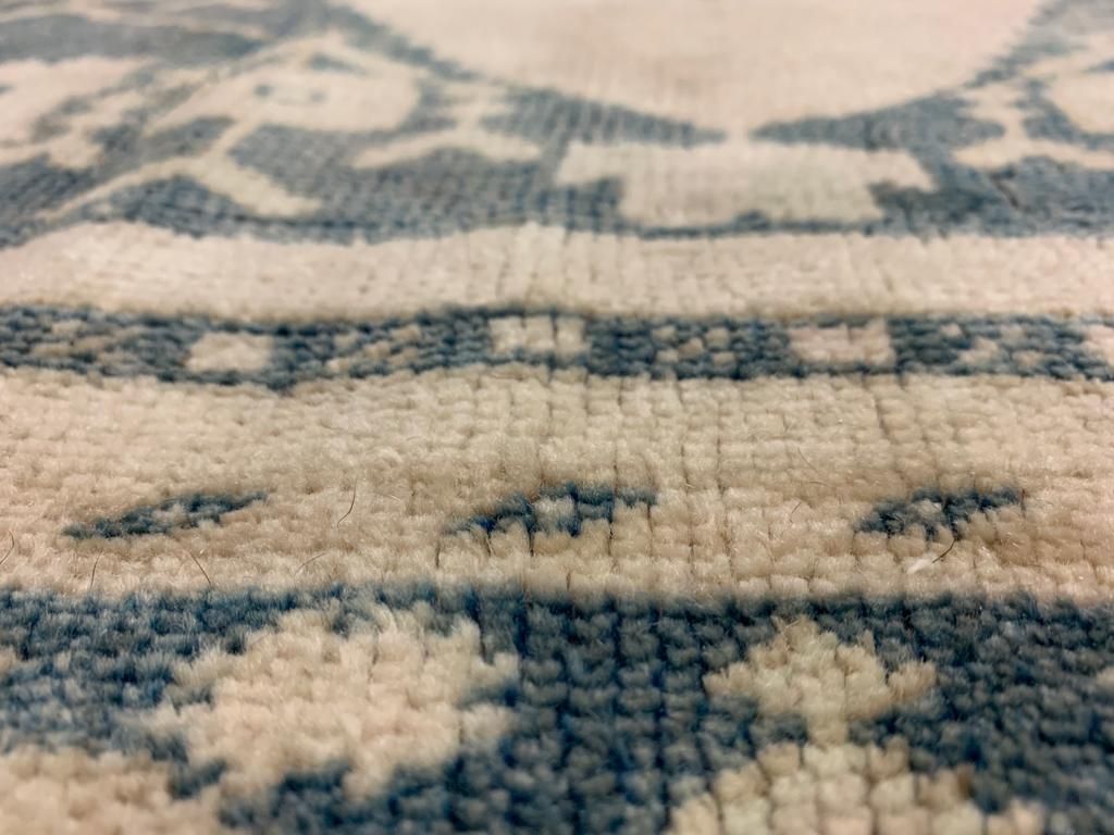 5x9 Ivory and Blue Turkish Tribal Rug